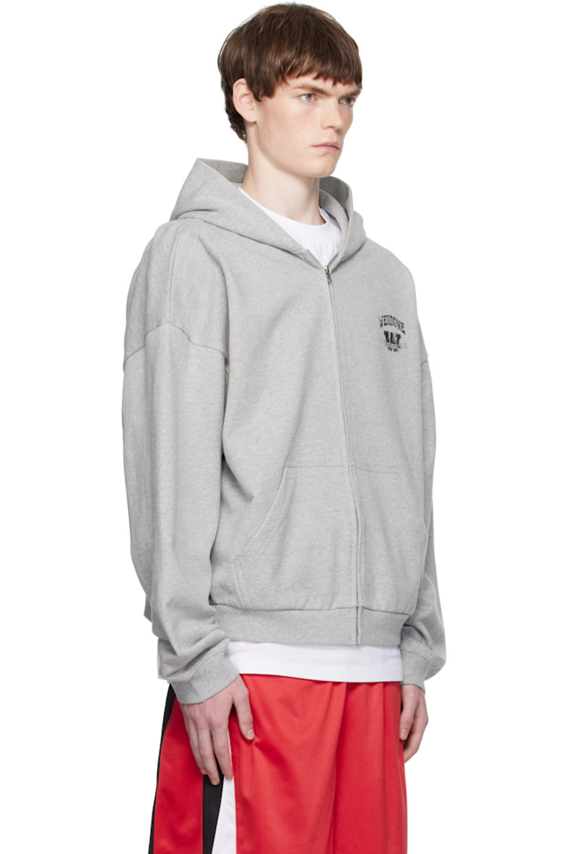 Heavyweight cotton fleece hoodie.

· Zip closure
· Logo graphic printed at chest and back
· Patch pockets at waist
· Rib-knit hem and cuffs
· Dropped shoulders

Supplier color: Melange Grey