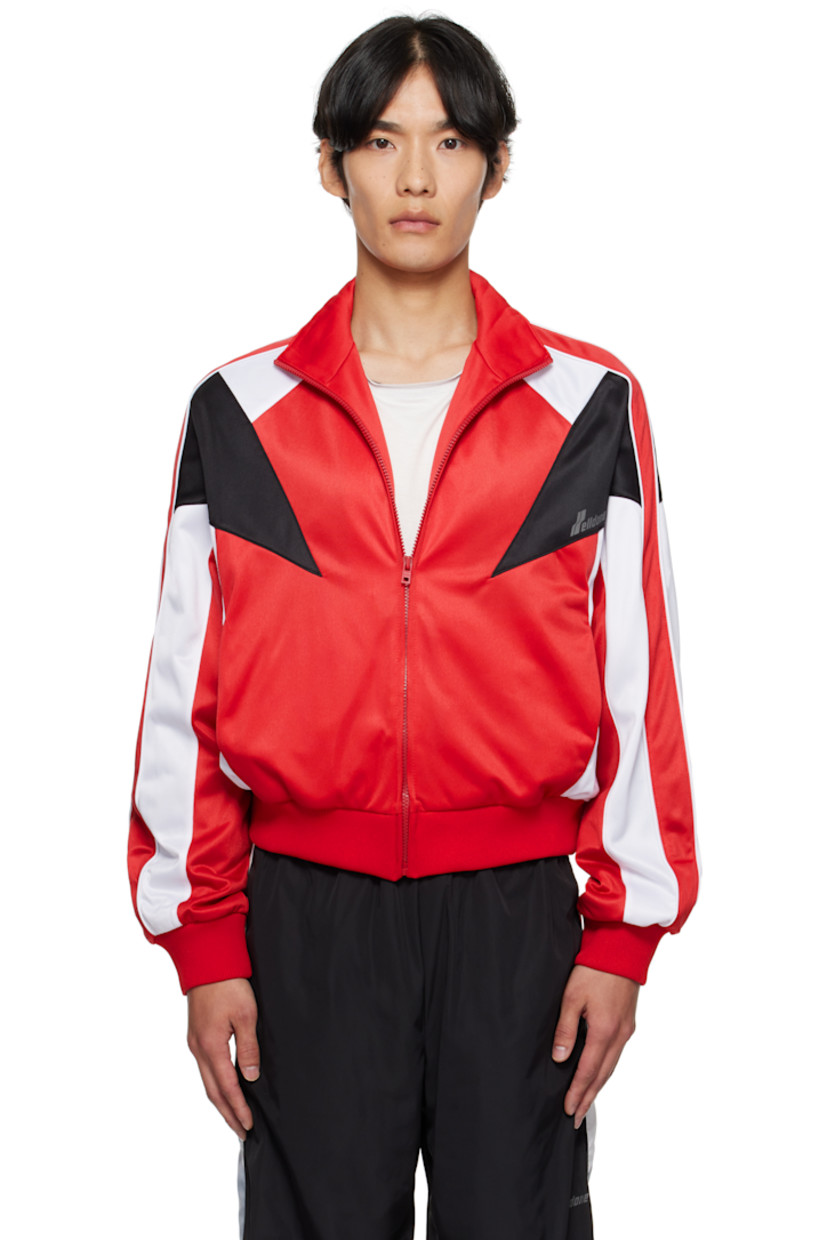 Jersey track jacket.

· Stand collar
· Zip closure
· Reflective logo printed at chest
· Seam pockets at waist
· Rib-knit hem and cuffs
· Piping and stripe appliqués at raglan sleeves
· Full mesh lining

Supplier color: Red