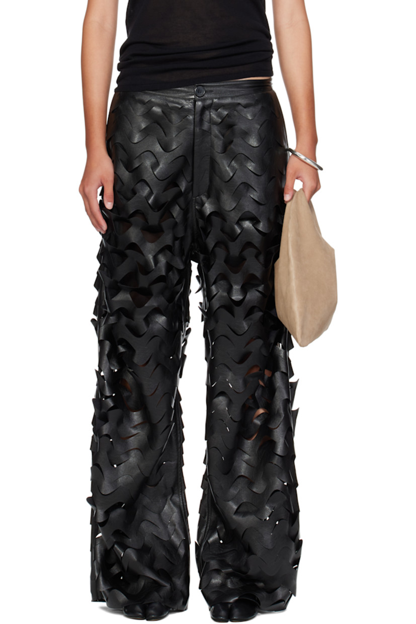 Buffed faux-leather pants.

· Laser-cut pattern throughout
· Two-pocket styling
· Zip-fly
·� Full mesh lining

Supplier color: Black