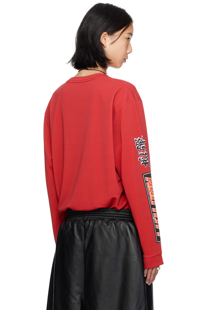 Polyester mesh jersey. 

· Crewneck
· Logo, text, and graphics printed at front and sleeves
· Dropped shoulders

Supplier color: Motocross/Blood red