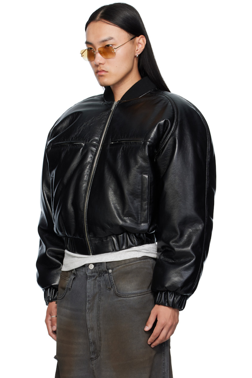 Padded crackled faux-leather bomber jacket. 

· Rib-knit stand collar 
· Zip closure
· Zip pockets at chest
· Welt pockets at waist 
· Elasticized hem and cuffs
· Raglan sleeves
· Full satin lining 

Supplier color: Black