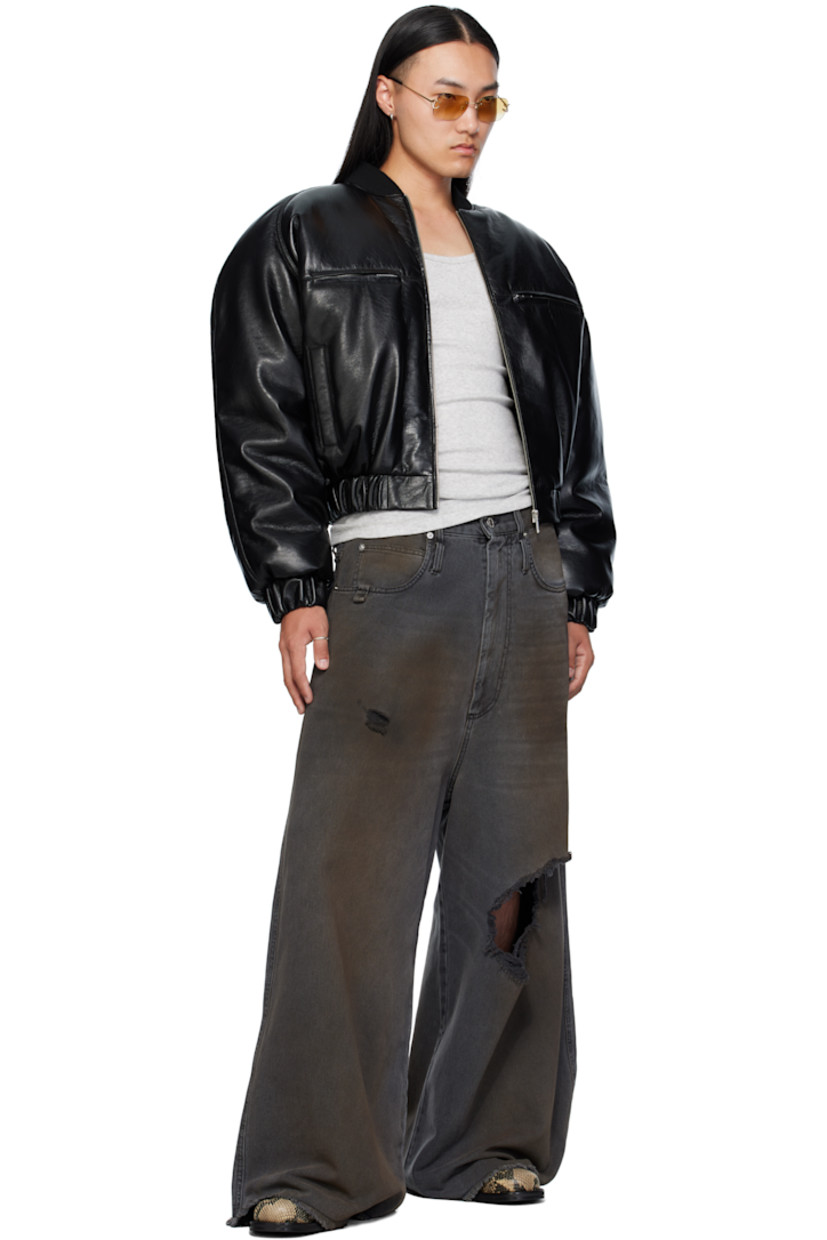 Non-stretch denim jeans.

· Wide-leg 
· Fading, whiskering, smudging, and distressing throughout 
· Belt loops
· Five-pocket styling
· Zip fly 
· Concealed drawstring at waistband 
· Hammer loop at front pocket 
· Raw edge at cuffs
· Logo patch at back waistband
· Logo-engraved silver-tone hardware

Supplier color: Dirty outcast grey