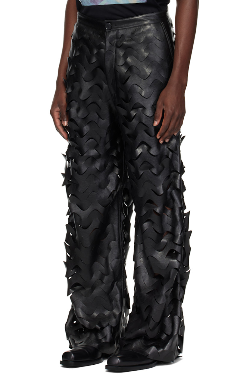 Buffed faux-leather pants.

· Laser-cut pattern throughout
· Two-pocket styling
· Zip-fly
· Full mesh lining

Supplier color: Black