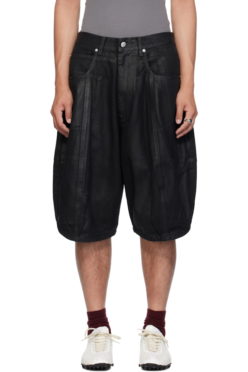 Coated non-stretch denim shorts.

· Belt loops
· Five-pocket styling
· Zip fly 
· Pleats and darts at front 
· Logo patch at back waistband
· Logo-engraved silver-tone hardware 

Supplier color: Coated black