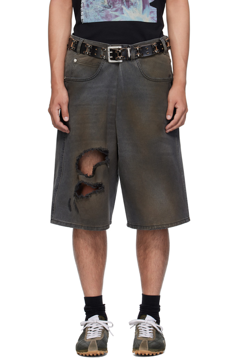 Non-stretch denim shorts.

· Wide-leg 
· Fading, whiskering, smudging, and distressing throughout 
· Belt loops
· Five-pocket styling
· Pleat at zip fly 
· Logo patch at back waistband
· Logo-engraved silver-tone hardware

Supplier color: Dirty outcast grey