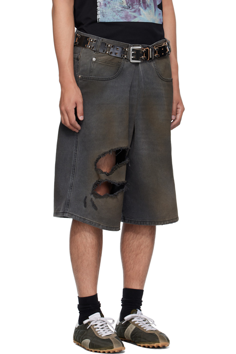 Non-stretch denim shorts.

· Wide-leg 
· Fading, whiskering, smudging, and distressing throughout 
· Belt loops
· Five-pocket styling
· Pleat at zip fly 
· Logo patch at back waistband
· Logo-engraved silver-tone hardware

Supplier color: Dirty outcast grey