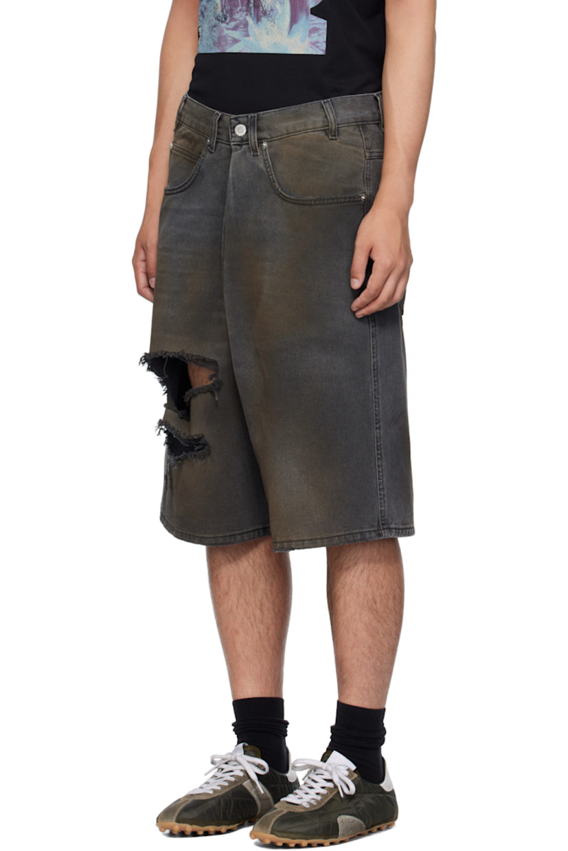 Non-stretch denim shorts.

· Wide-leg 
· Fading, whiskering, smudging, and distressing throughout 
· Belt loops
· Five-pocket styling
· Pleat at zip fly 
· Logo patch at back waistband
· Logo-engraved silver-tone hardware

Supplier color: Dirty outcast grey