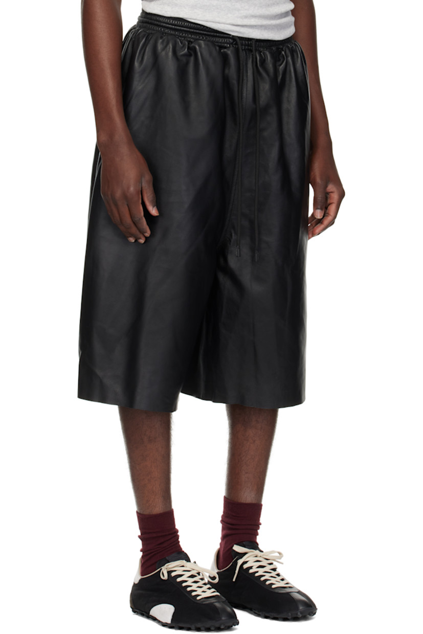 Grained nappa lambskin shorts. 

· Drawstring at elasticized waistband
· Two-pocket styling
· Cotton poplin lining

Supplier color: Black