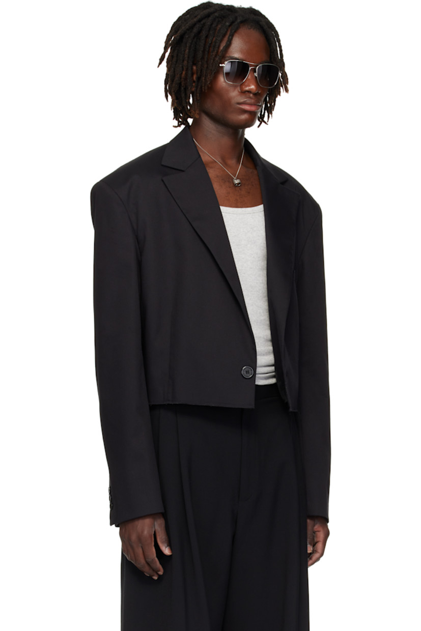 Cotton-blend twill blazer.

· Peaked lapel
· Single-button closure
· Welt pocket at chest
· Darts at waist
· Raw edge at cropped hem
· Buttoned surgeon's cuffs
· Central seam at back
· Welt pocket at interior
· Patterned satin lining

Supplier color: Black
