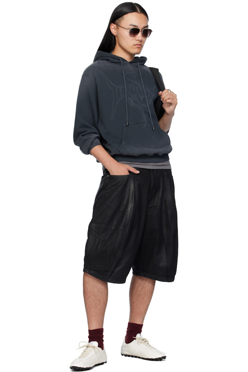 French terry hoodie. 

· Fading throughout 
· Drawstring at hood
· Logo and graphic printed at front 
· Kangaroo pocket
· Rib-knit hem and cuffs
· Dropped shoulders 

Supplier color: Metal snake/Black smoke