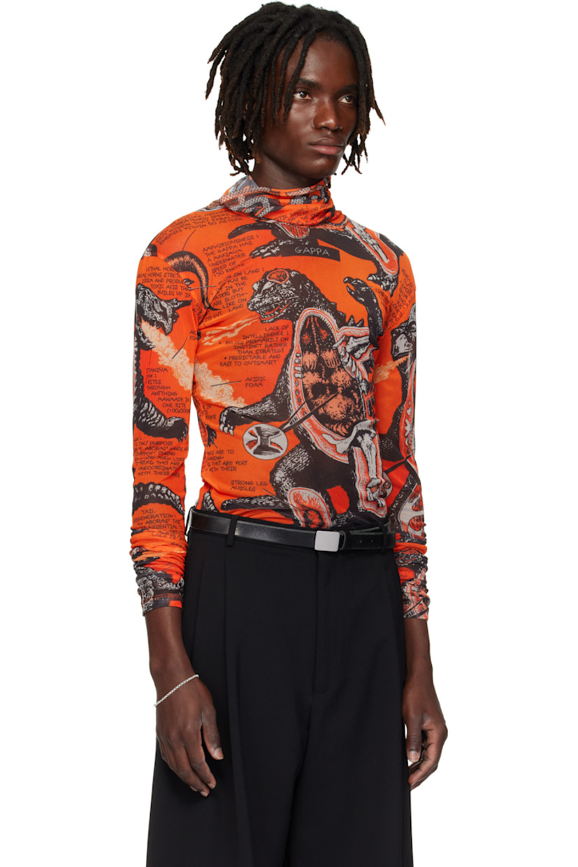Sheer stretch mesh turtleneck. Graphic pattern printed throughout.

Supplier color: Monsters/Kumquat