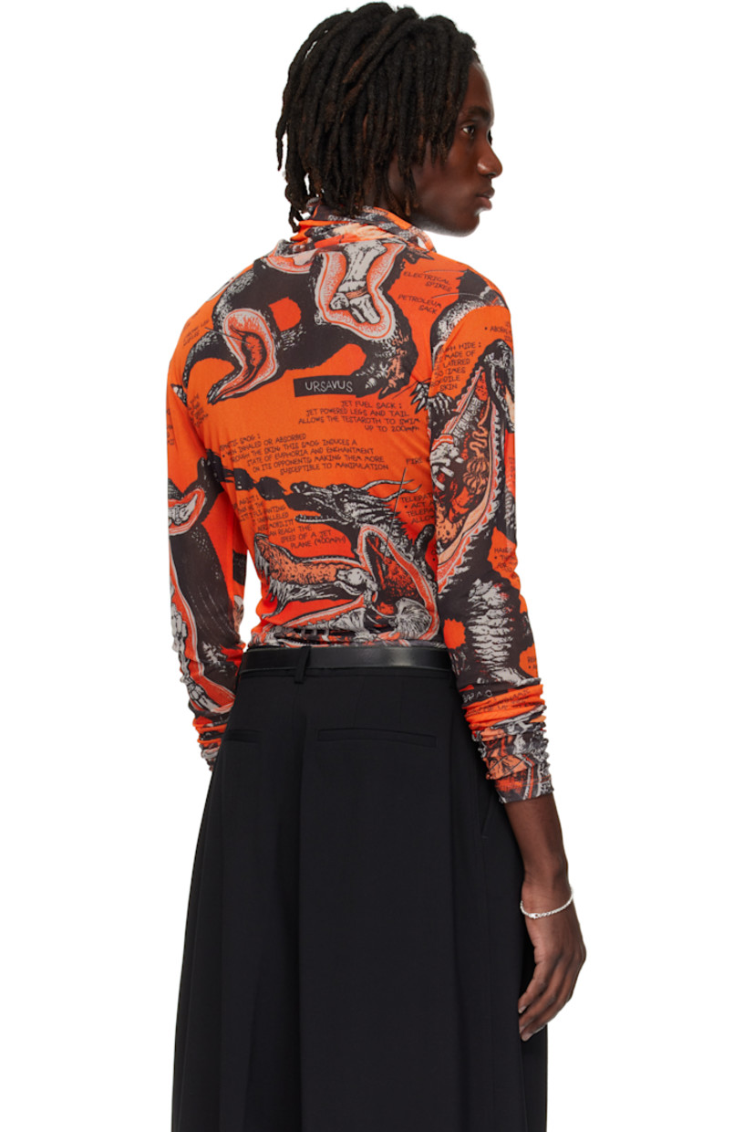 Sheer stretch mesh turtleneck. Graphic pattern printed throughout.

Supplier color: Monsters/Kumquat