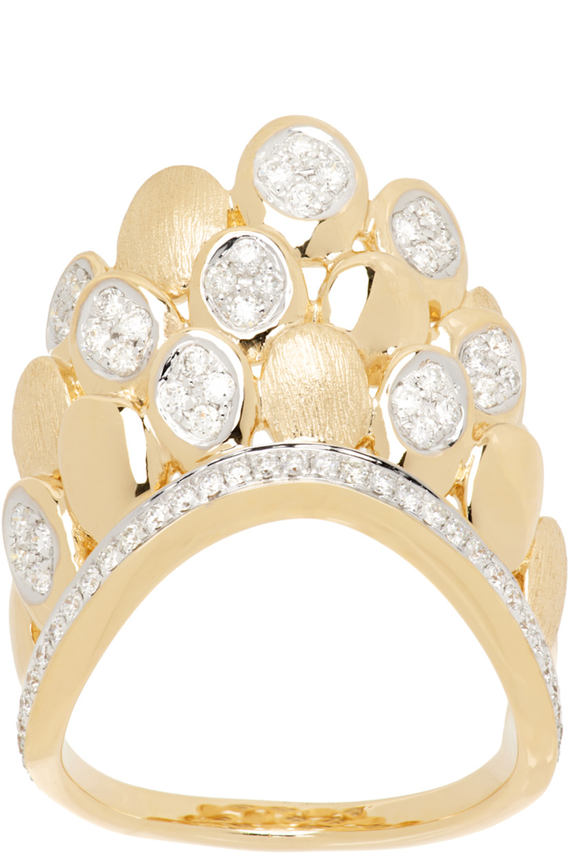 Modified band ring in 14k gold. 

· White rhodium detailing throughout
· 0.35 cttw diamonds
· Scalloped construction with prong-set diamonds
· Pavé-set diamonds at length of band
· Logo stamp at inner band

Supplier color: 14k