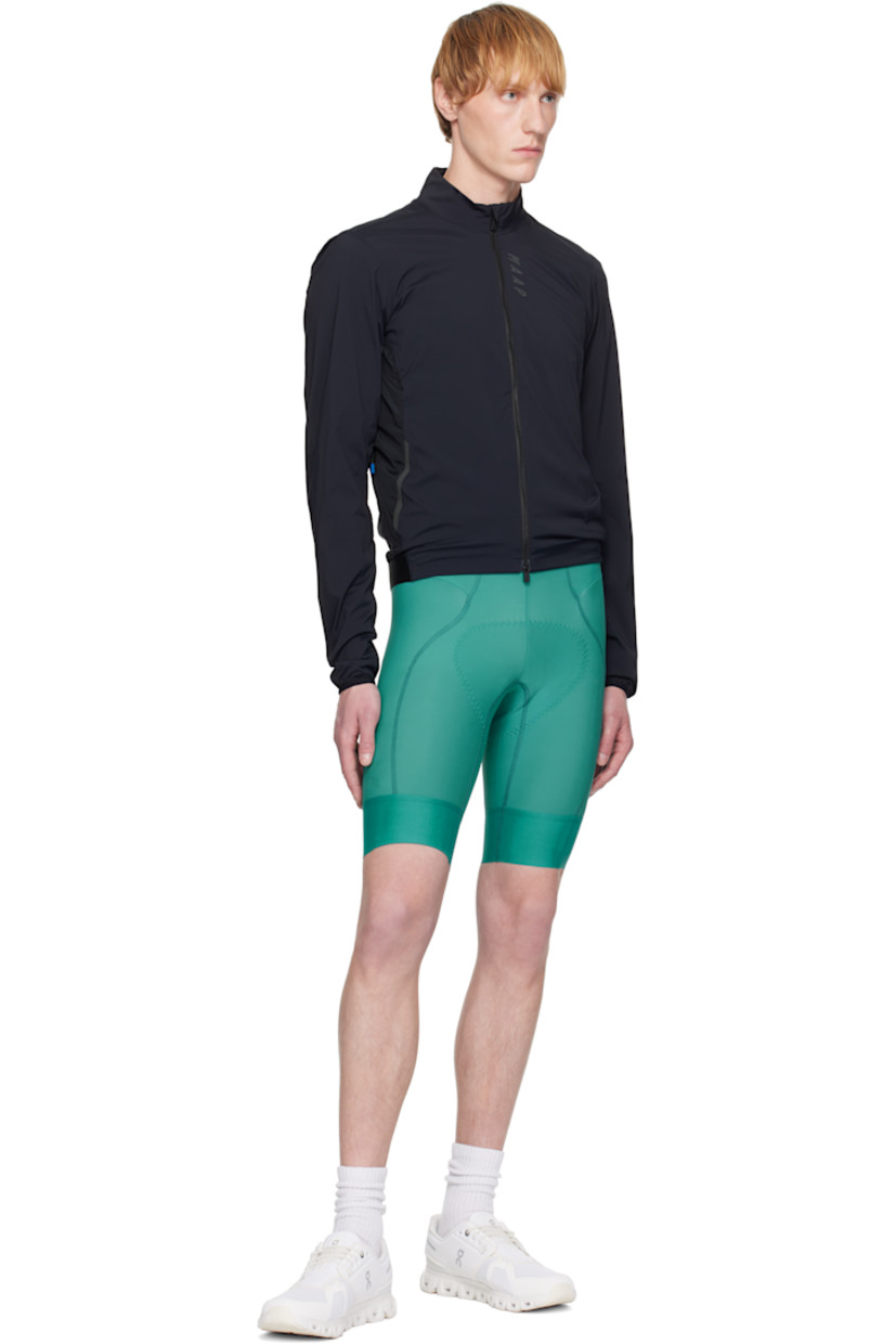 Teijin Octa®-insulated stretch nylon ripstop jacket.

· Packs into waist zip pocket
· Lightweight and windproof
· Stand collar
· Two-way zip closure
· Reflective logo printed at chest and back
· Reflective trim at zip pockets
· Logo-woven elasticized hem
· Elasticized cuffs
· Partially lined
· Logo-engraved black hardware
· Total weight: 225 g

Supplier color: Black
