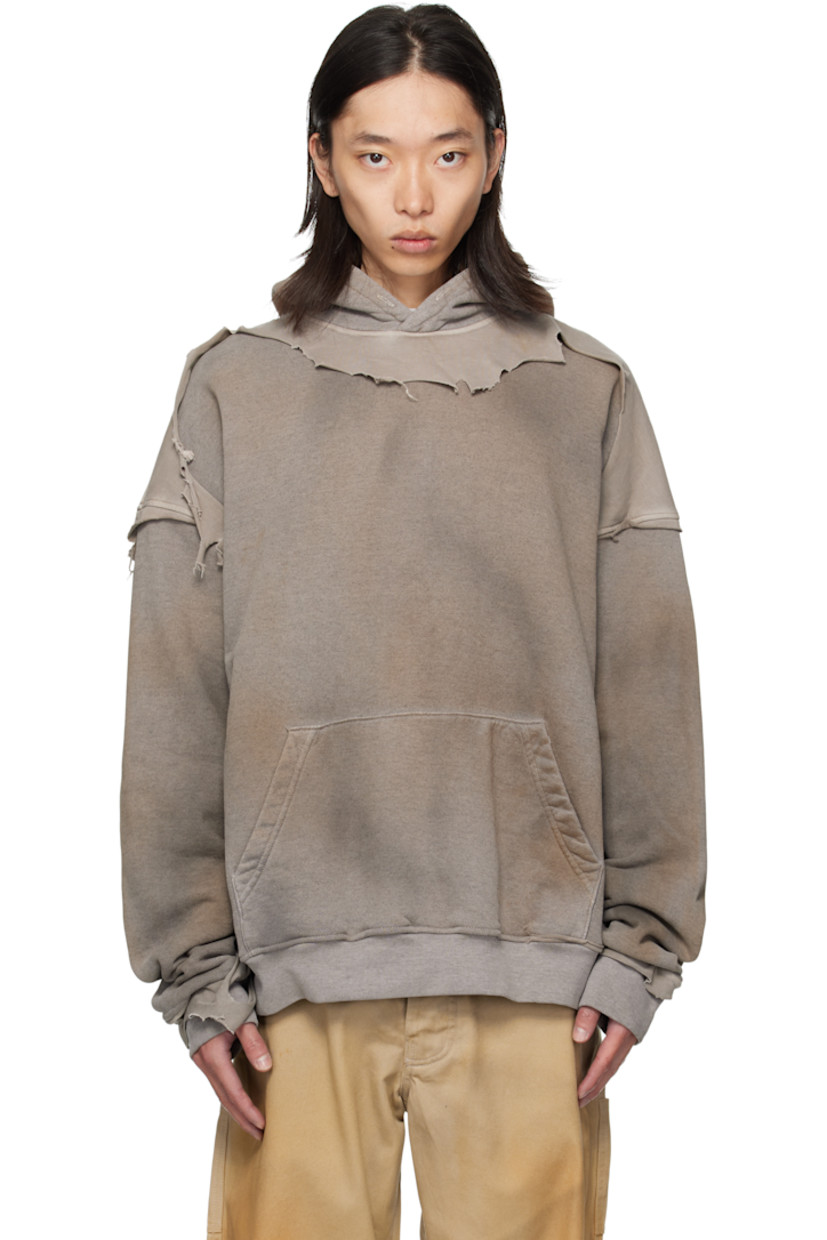 Cotton fleece hoodie. 

· Discoloration and jersey trim with rolled edges throughout 
· Kangaroo pocket
· Rib-knit hem and cuffs
· Dropped shoulders

Supplier color: Dirty grey
