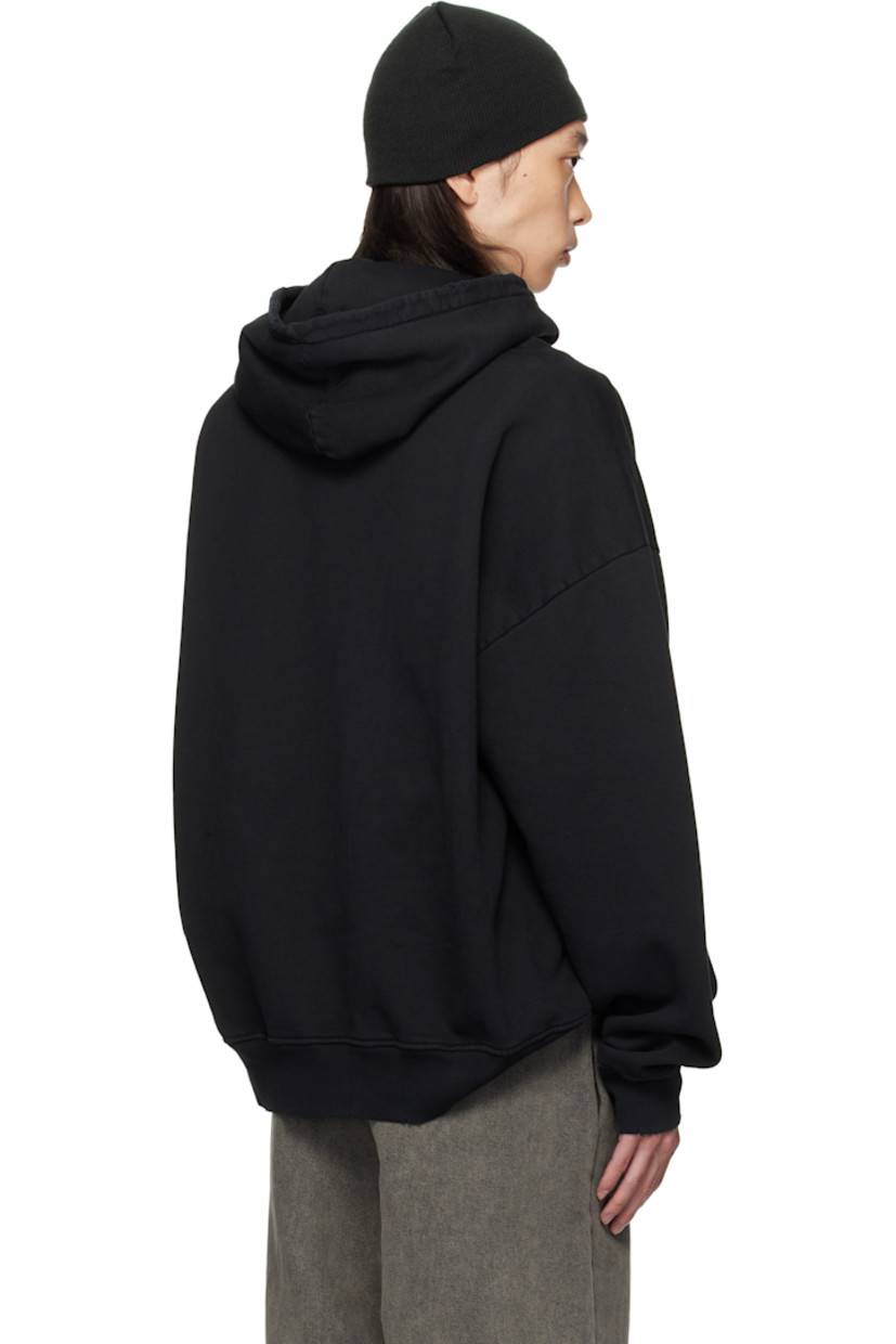 Cotton fleece hoodie. 

· Crackled text bonded at front 
· Kangaroo pocket
· Rib-knit hem and cuffs
· Dropped shoulders

Supplier color: Black