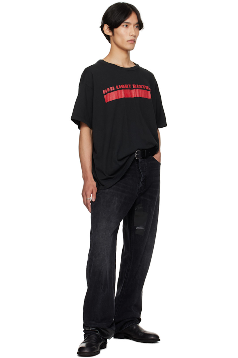 Cotton jersey T-shirt. 

· Rib-knit crewneck
· Crackled text bonded at front 
· Dropped shoulders

Supplier color: Black