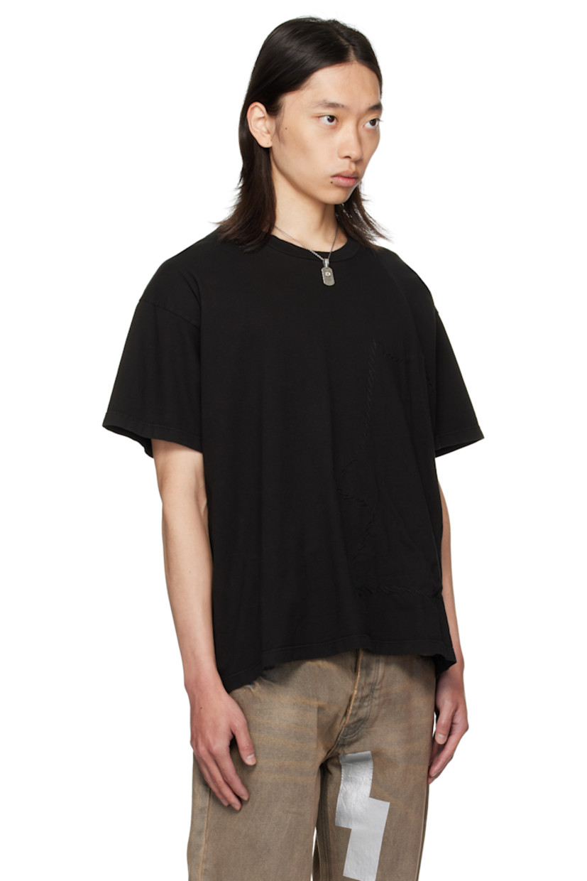 Cotton jersey T-shirt. 

· Exposed seams throughout 
· Rib-knit crewneck
· Jersey appliqué with rolled edges at front 
· Dropped shoulders

Supplier color: Black