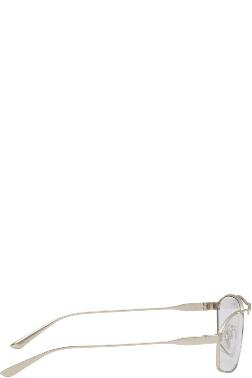 Rectangular metal-frame sunglasses in silver tone.

· Gray lenses
· Logo engraved at face
· Adjustable rubber nose pads
· Includes case
· Size: 63.16 140

Supplier color: Silver