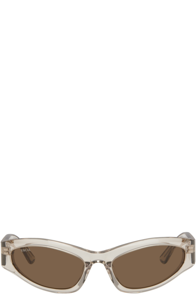 Cat-eye transparent acetate-frame sunglasses in beige.

· Brown lenses
· Logo etched at lens
· Integrated nose pads
· Logo printed at temples 
· Exposed core wires
· Includes case
· Size: 58.19 140

Supplier color: Beige
