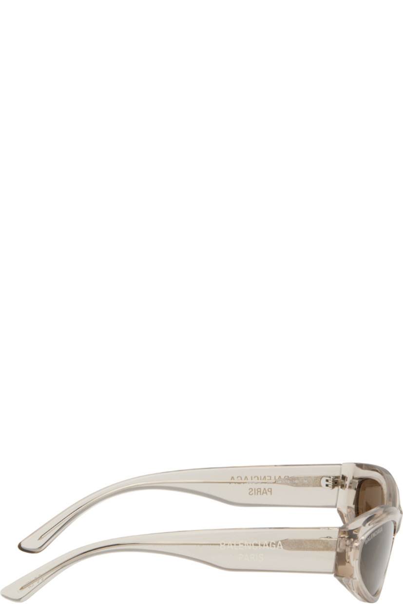 Cat-eye transparent acetate-frame sunglasses in beige.

· Brown lenses
· Logo etched at lens
· Integrated nose pads
· Logo printed at temples 
· Exposed core wires
· Includes case
· Size: 58.19 140

Supplier color: Beige