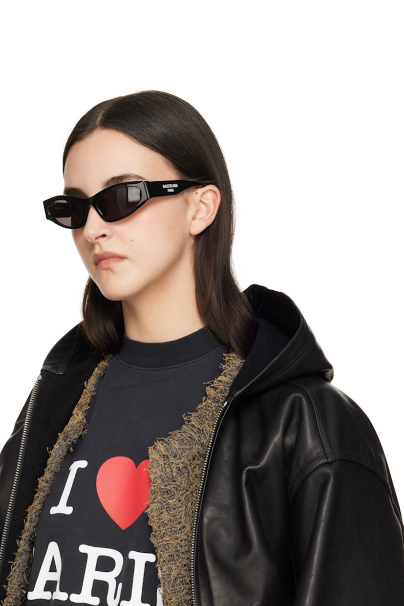Cat-eye acetate-frame sunglasses in black.

· Gray lenses
· Logo etched at lens
· Integrated nose pads
· Logo printed at temples 
· Includes case
· Size: 58.19 140

Supplier color: Black