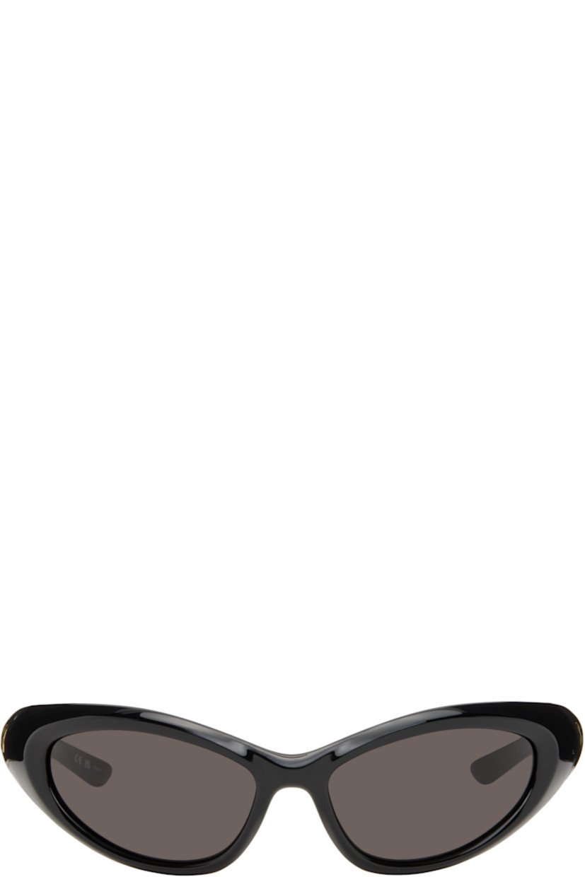 Wraparound injection-molded nylon-frame sunglasses in black.

· Bio-based nylon
· Gray lenses
· 100% UV protection, category 3
· Inset logo hardware at temples
· Includes case
· Size: 70.19 130

Supplier color: Black/Black/Grey