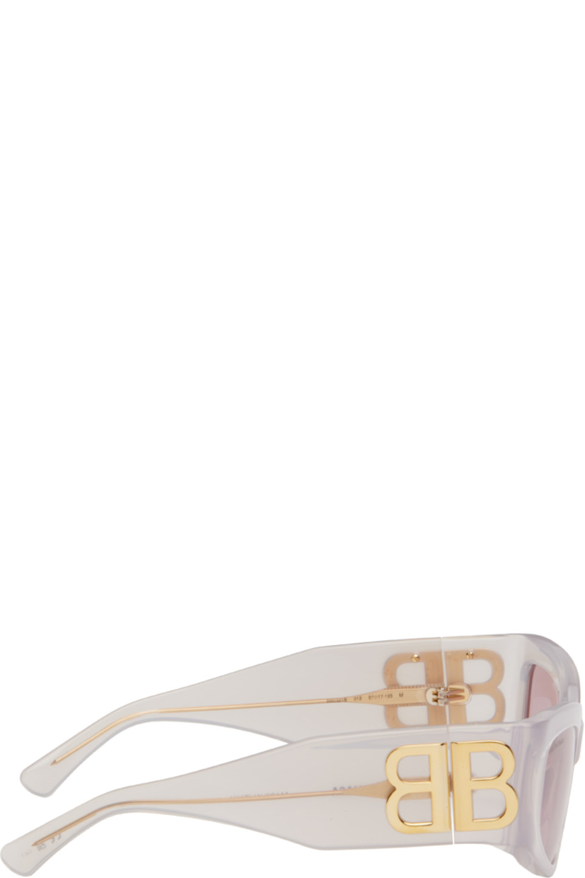 Cat-eye transparent Eastman Acetate Renew™-frame sunglasses in pink.

· Pink lenses
· Logo etched at lens 
· Integrated nose pads
· Logo hardware at hinges
· Exposed core wires
· Includes case
· Size: 57.17 145

Supplier color: White