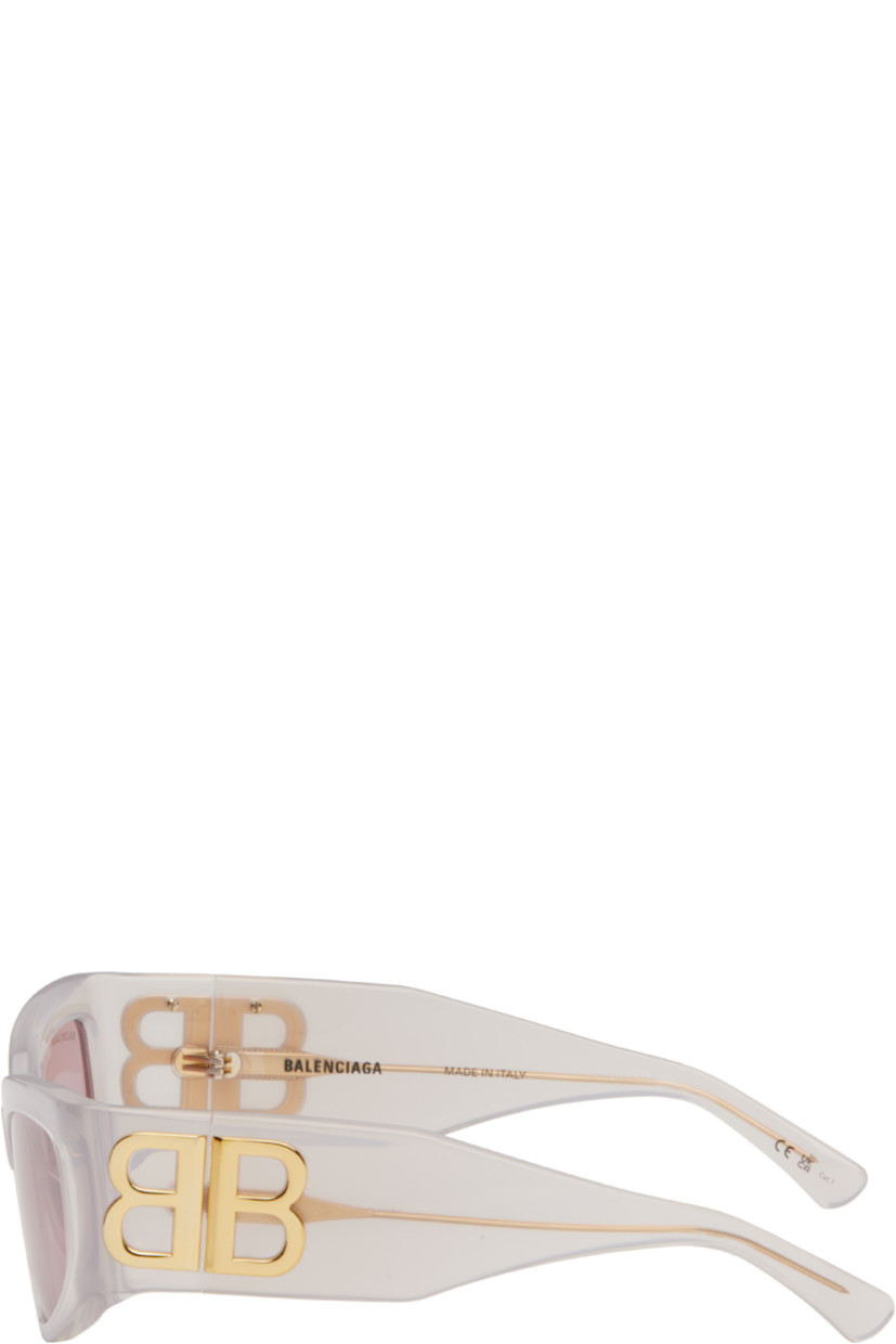 Cat-eye transparent Eastman Acetate Renew™-frame sunglasses in pink.

· Pink lenses
· Logo etched at lens 
· Integrated nose pads
· Logo hardware at hinges
· Exposed core wires
· Includes case
· Size: 57.17 145

Supplier color: White
