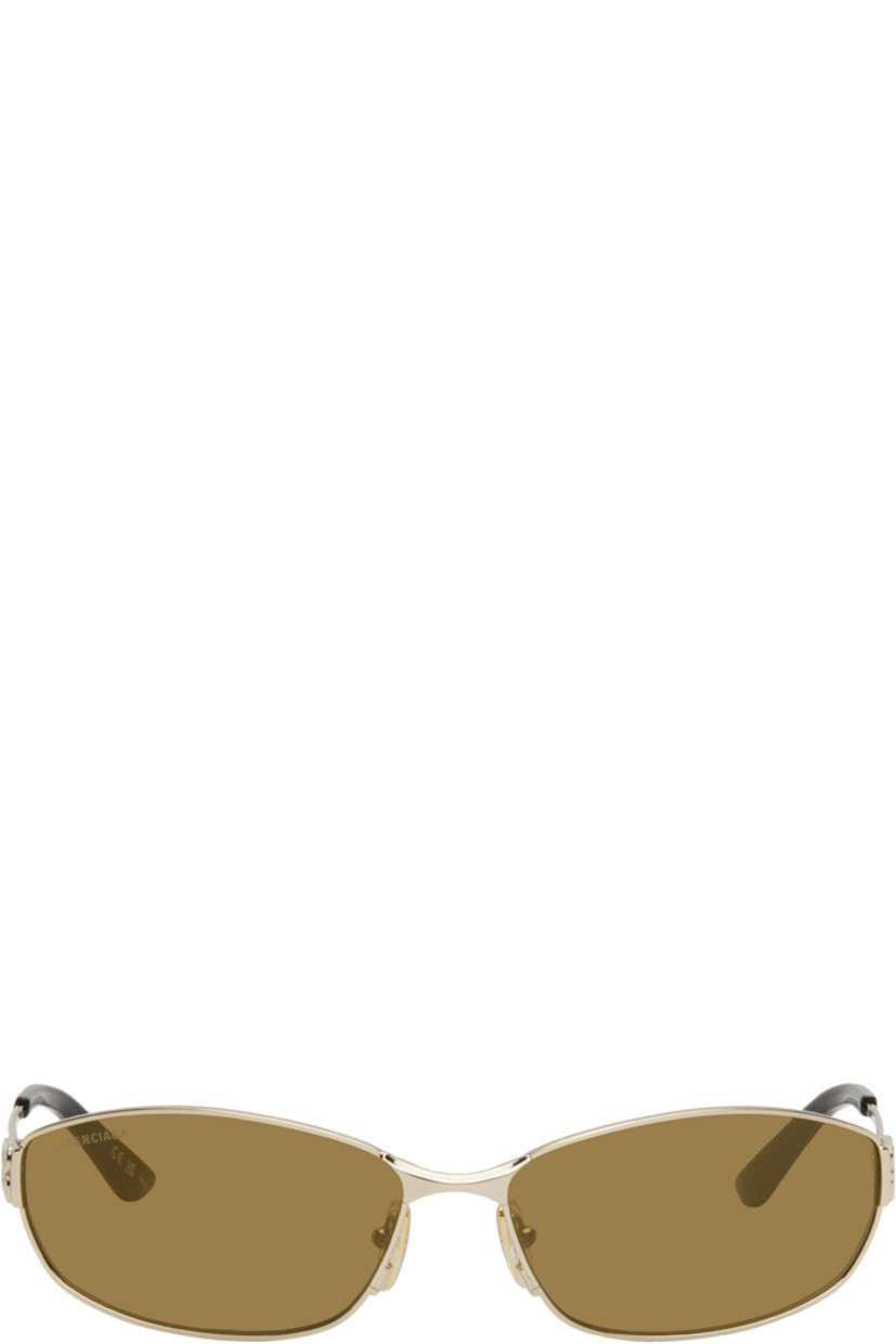 Rectangular metal-frame sunglasses in gold tone.

· Brown lenses
· Logo etched at lenses
· Adjustable rubber nose pads
· Logo hardware at hinges
· Acetate temple tips
· Includes case
· Size: 65.16 140

Supplier color: Gold