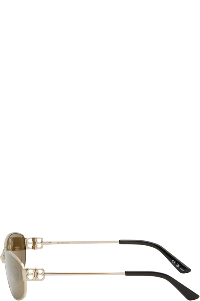 Rectangular metal-frame sunglasses in gold tone.

· Brown lenses
· Logo etched at lenses
· Adjustable rubber nose pads
· Logo hardware at hinges
· Acetate temple tips
· Includes case
· Size: 65.16 140

Supplier color: Gold