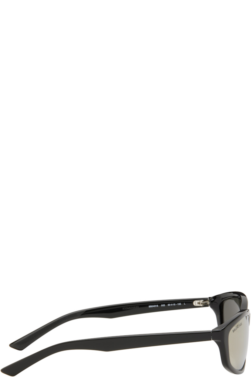 Oval Eastman Acetate Renew™-frame sunglasses in black.

· Mirrored gray lenses
· 100% UVA/UVB protection, category 3
· Logo etched at lens 
· Integrated nose pads
· Logo engraved at temple
· Includes case
· Size: 60.15 135

Supplier color: Black/Black/White