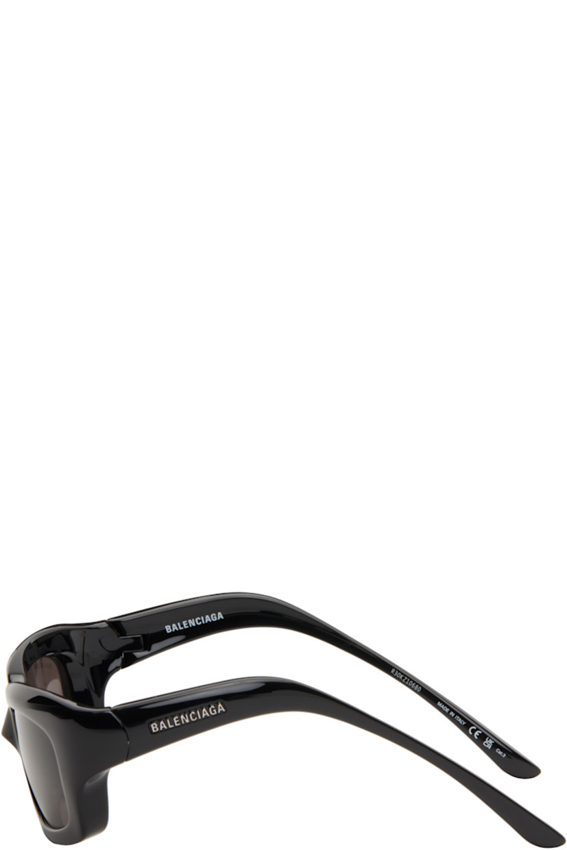 Rectangular injection-molded nylon-frame sunglasses in black.

· Bio-based nylon
· Gray lenses
· Logo etched at lens
· Logo hardware at temples
· Includes case
· Size: 60.18 140

Supplier color: Black/Black/Grey