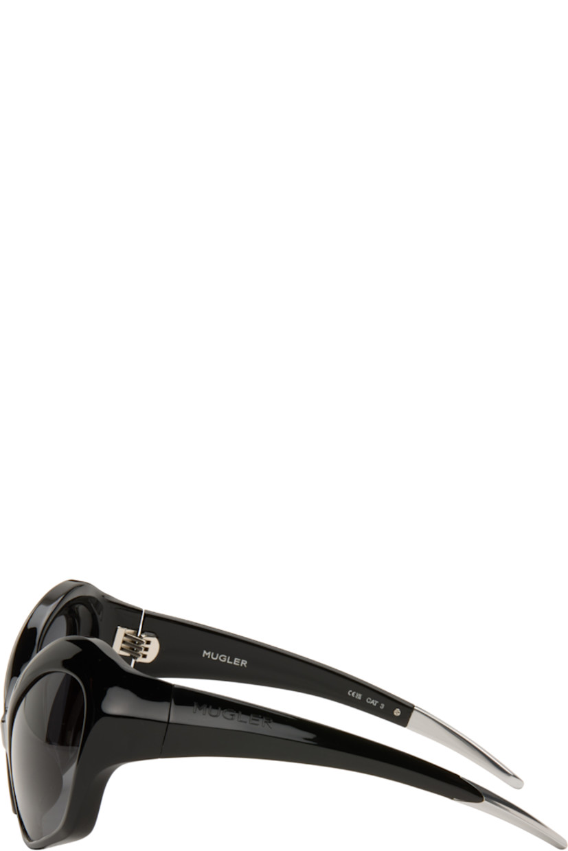 Modified cat-eye acetate-frame sunglasses.

· Integrated nose pads
· Black lenses with 100% UVA/UVB protection
· Logo etched at temples
· Hardware at temple tips
· Titanium hardware
· Logo-embossed squeeze-top pouch
· Size: 58.20 120

Supplier color: Black