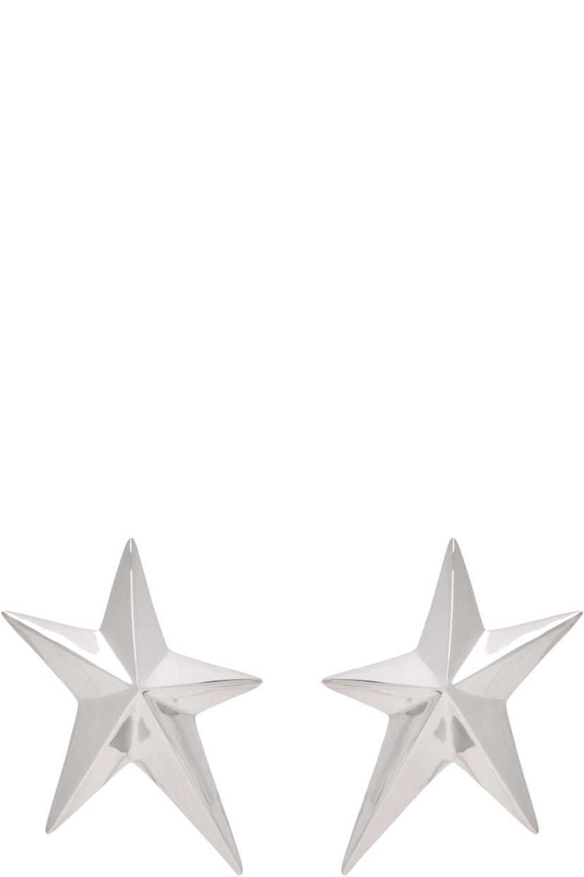 Pair of earrings in silver tone.

· Post-stud fastening
· H1.5" x W1"

Supplier color: Palladium