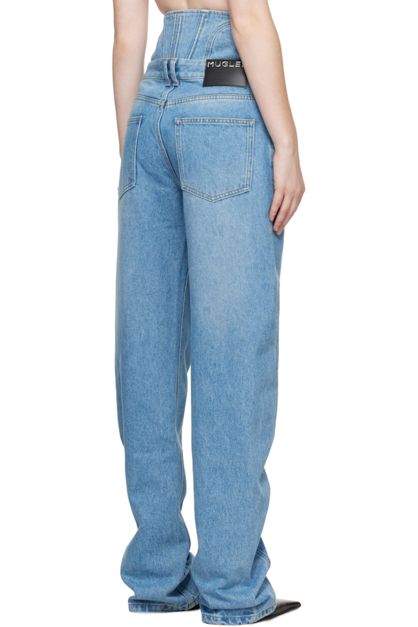 Non-stretch denim jeans. 

· Fading and whiskering throughout 
· High-rise 
· Belt loops
· Five-pocket styling
· Extended and boned waistband with hook-eye closure
· Logo patch at back waist
· Contrast stitching in tan 

Supplier color: Medium blue