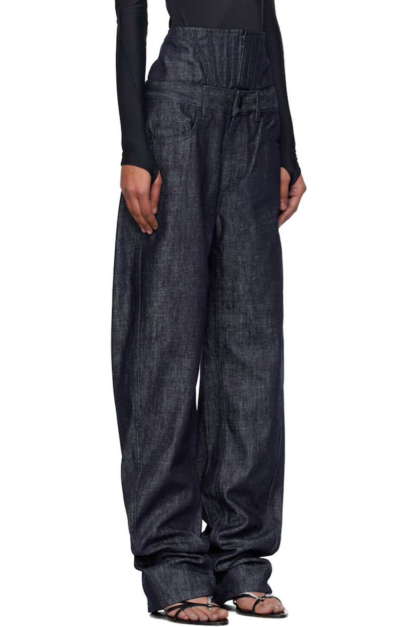 Non-stretch organic cotton-blend denim jeans. 

· Straight-leg 
· High-rise 
· Boning and hook-eye fastening at corset waist
· Belt loops
· Five-pocket styling
· Zip fly 
· Logo patch at back waistband

Supplier color: Raw blue