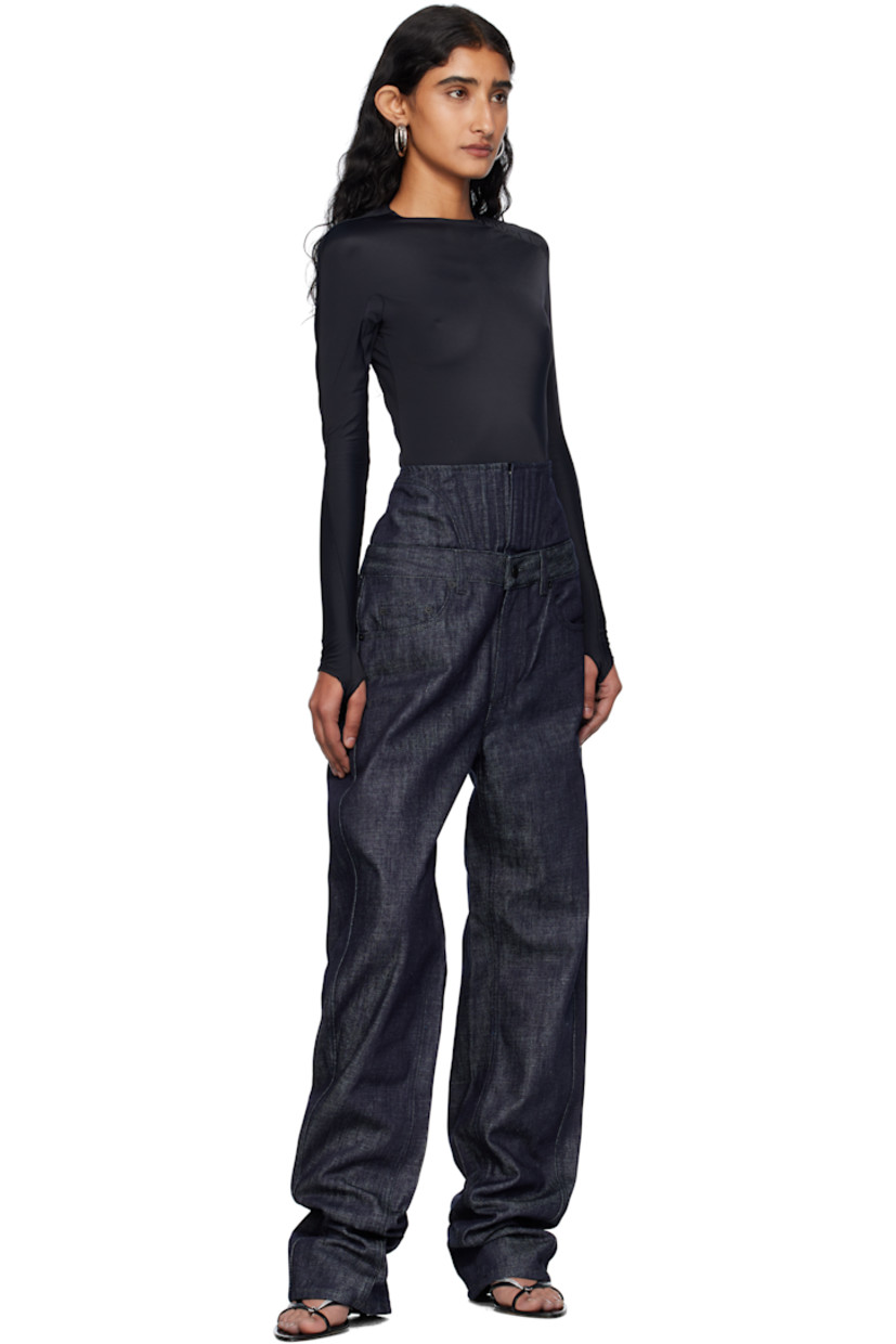 Non-stretch organic cotton-blend denim jeans. 

· Straight-leg 
· High-rise 
· Boning and hook-eye fastening at corset waist
· Belt loops
· Five-pocket styling
· Zip fly 
· Logo patch at back waistband

Supplier color: Raw blue