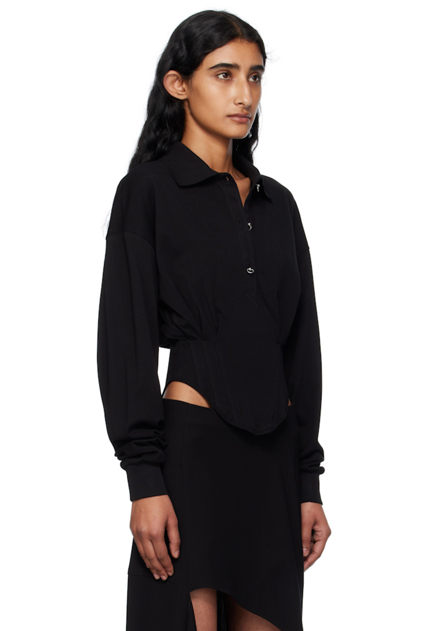 Cotton piqué corset-style polo. 

· Rib-knit spread collar
· Three-button placket 
· Pleats and boning at bodice 
· Zip closure at side seam
· Curved hem 
· Logo plaque at back collar 

Supplier color: Black
