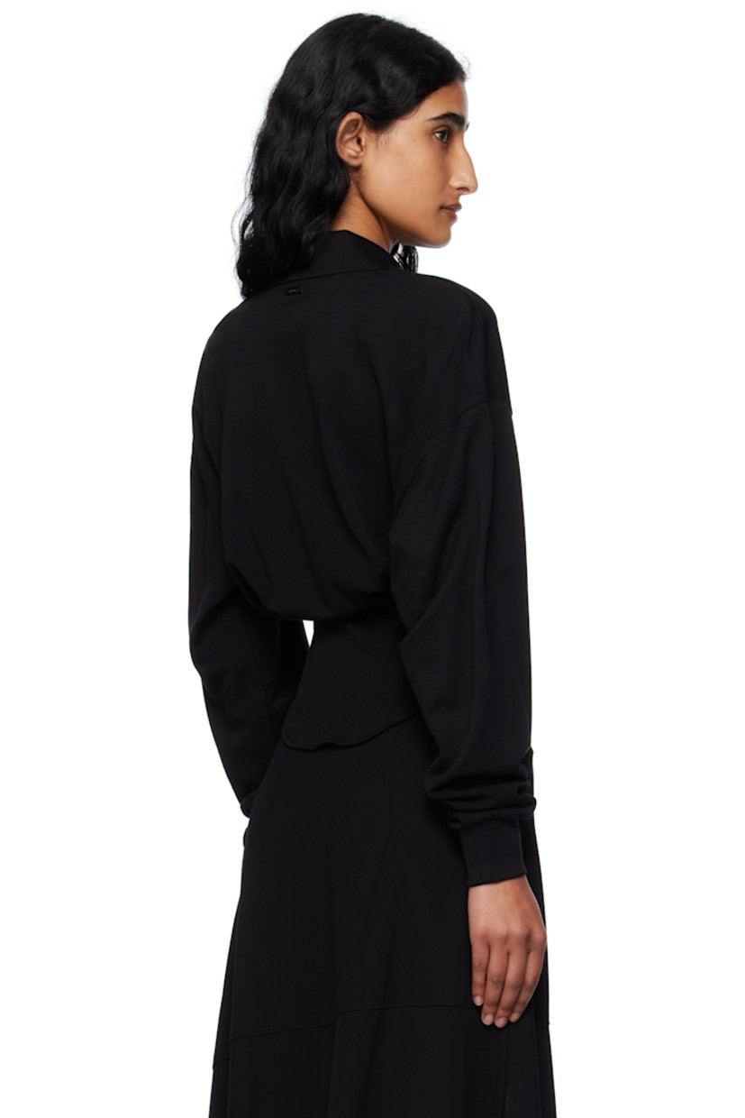 Cotton piqué corset-style polo. 

· Rib-knit spread collar
· Three-button placket 
· Pleats and boning at bodice 
· Zip closure at side seam
· Curved hem 
· Logo plaque at back collar 

Supplier color: Black