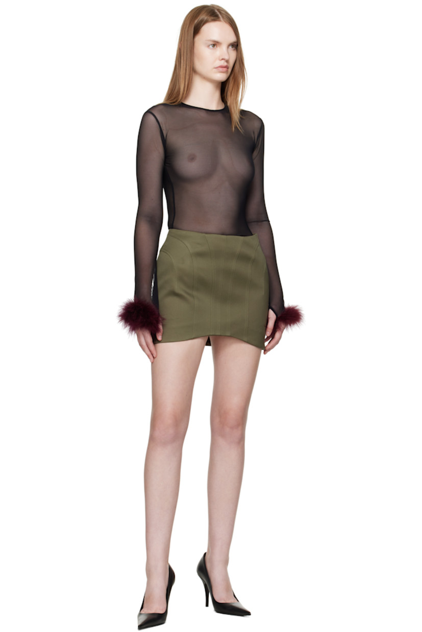 Stretch recycled mesh T-shirt.

· Sheer 
· Crewneck
· Faux-fur trim at cuffs

Supplier color: Dark plum/Black