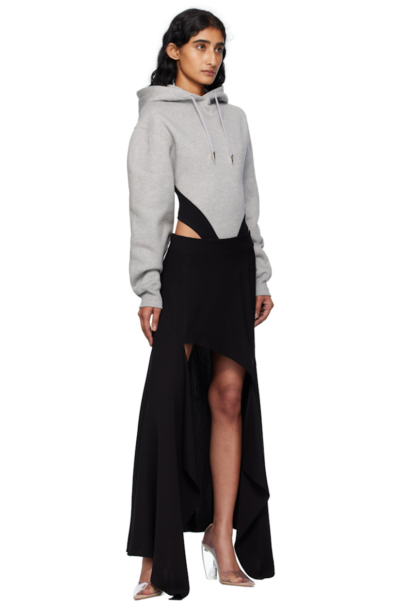 Organic cotton fleece and jersey bodysuit. 

· Drawstring with spiked aglets at hood
· Press-stud fastening at bottom 
· Dropped shoulders
· Rib-knit cuffs
· Logo plaque at back collar  

Supplier color: Grey melange/Black