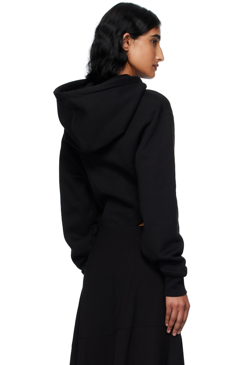 Organic cotton fleece and jersey bodysuit. 

· Drawstring with spiked aglets at hood
· Press-stud fastening at bottom 
· Dropped shoulders
· Rib-knit cuffs
· Logo plaque at back collar  

Supplier color: Black