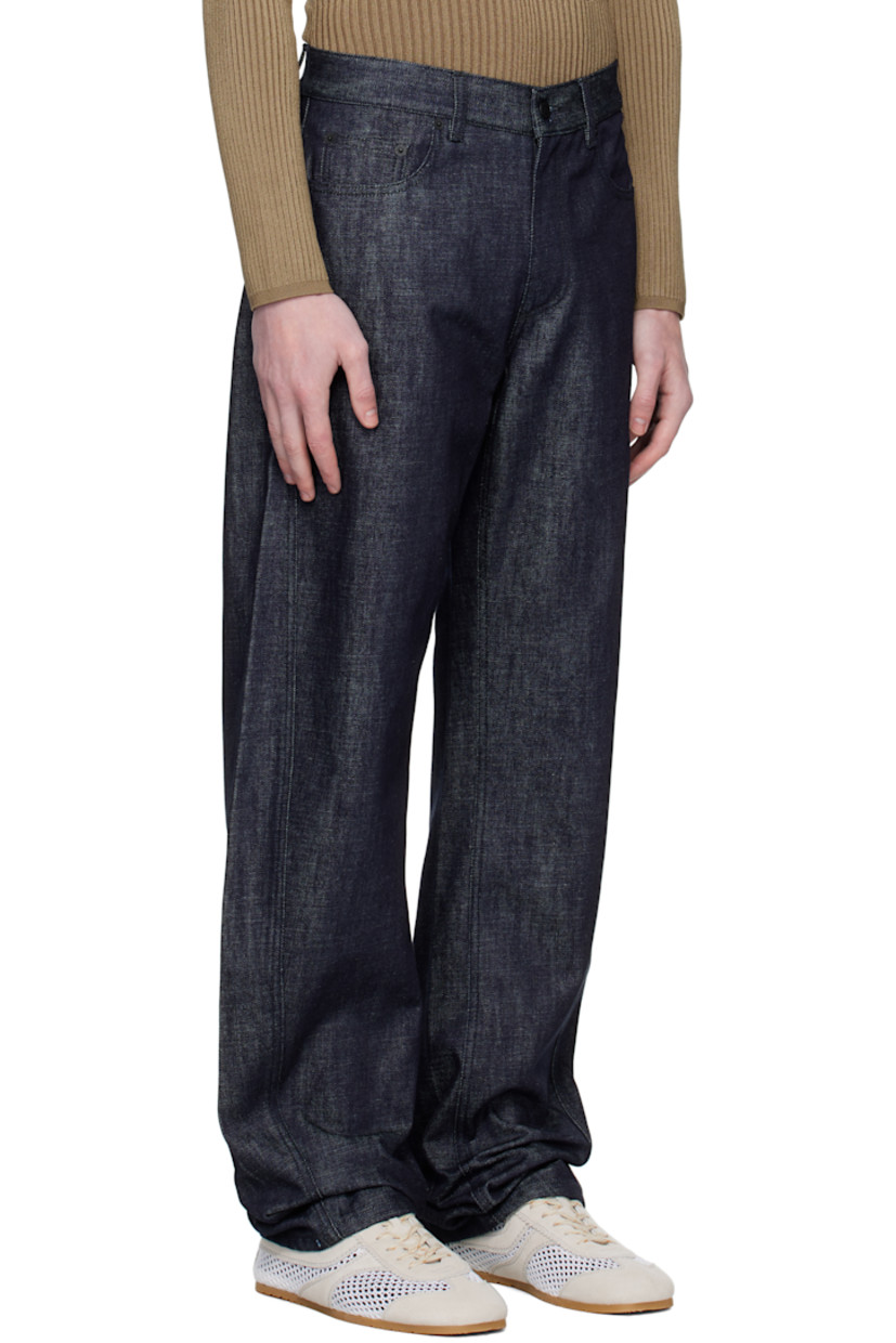 Non-stretch denim jeans.

· High-rise
· Belt loops
· Five-pocket styling 
· Zip fly
· Twisted outseams
· Logo patch at back waistband
· Logo-engraved hardware

Supplier color: Raw Blue