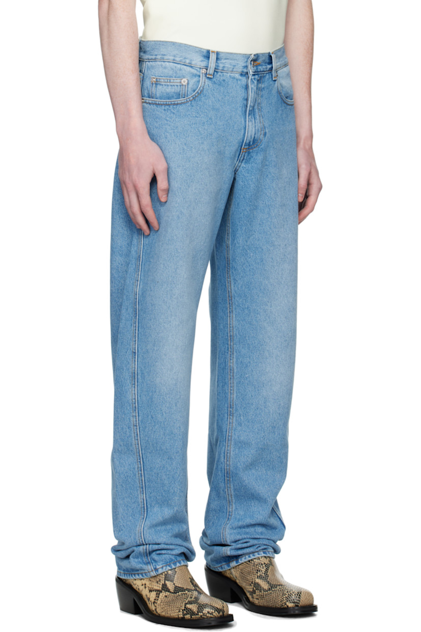 Non-stretch denim jeans.

· High-rise
· Belt loops
· Five-pocket styling
· Zip fly
· Twisted outseams
· Logo patch at back waistband
· Logo-engraved silver-tone hardware
· Contrast stitching in tan

Supplier color: Medium Blue