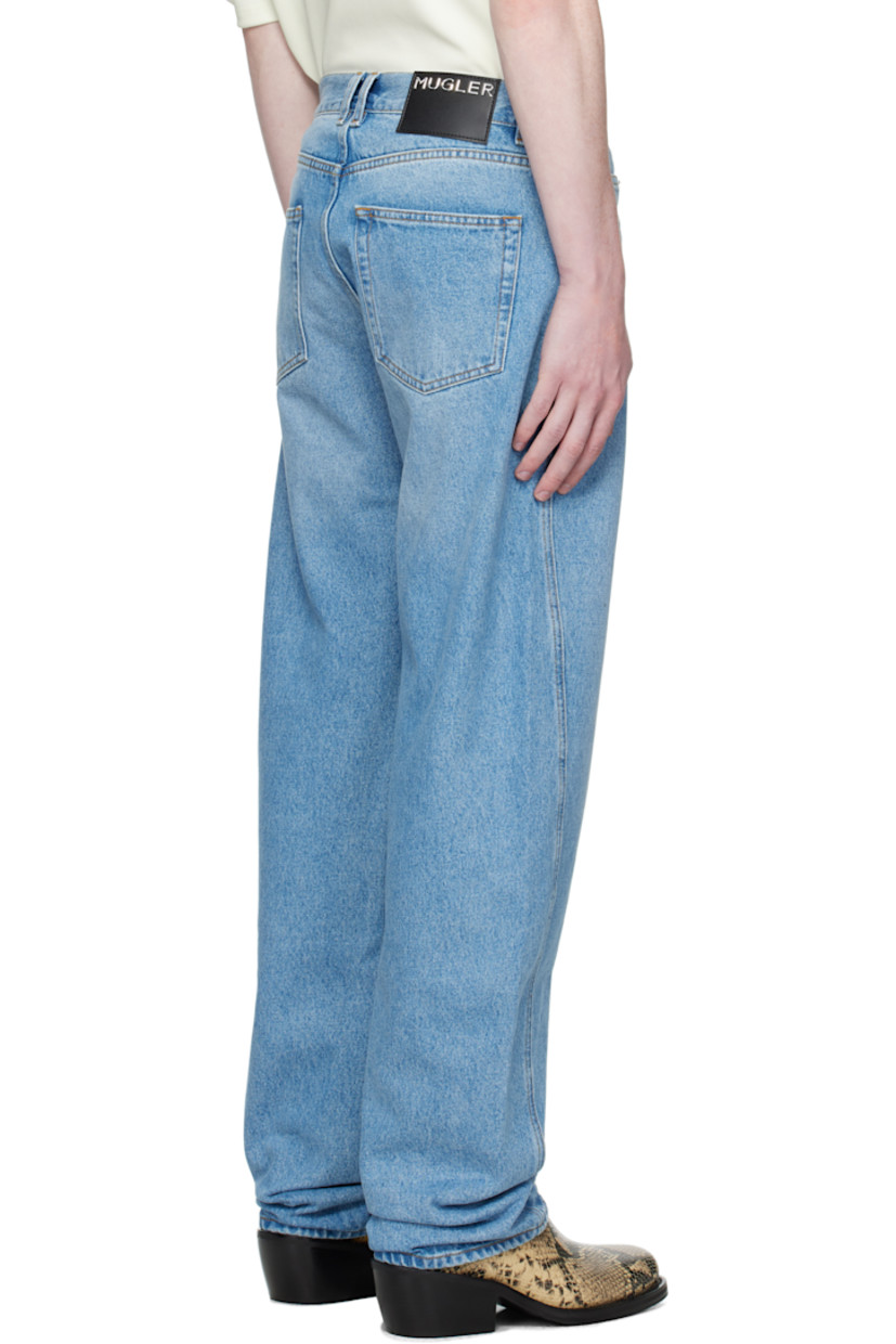 Non-stretch denim jeans.

· High-rise
· Belt loops
· Five-pocket styling
· Zip fly
· Twisted outseams
· Logo patch at back waistband
· Logo-engraved silver-tone hardware
· Contrast stitching in tan

Supplier color: Medium Blue