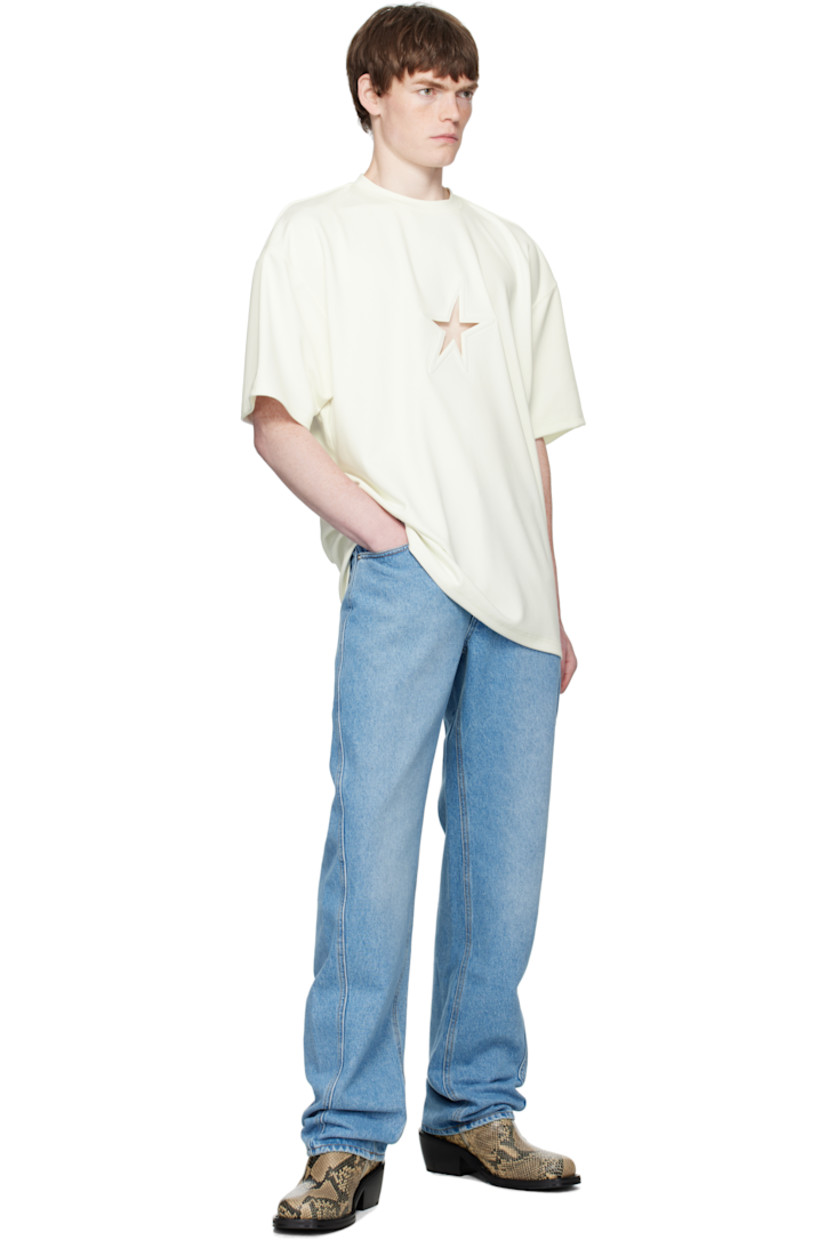 Non-stretch denim jeans.

· High-rise
· Belt loops
· Five-pocket styling
· Zip fly
· Twisted outseams
· Logo patch at back waistband
· Logo-engraved silver-tone hardware
· Contrast stitching in tan

Supplier color: Medium Blue