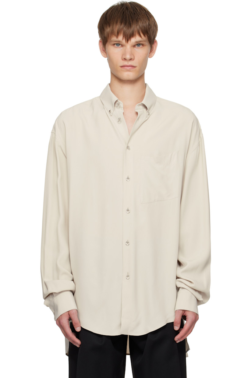 Plain-woven viscose shirt.

· Spread collar
· Graphic hardware at button closure
· Patch pocket at chest
· Droptail hem
· Buttoned barrel cuffs
· Pleats at back yoke

Supplier color: Sand