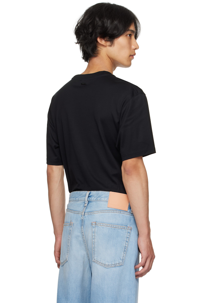Cotton jersey T-shirt. 

· Rib-knit crewneck
· Stretch nylon jersey corset-style panel at waist 
· Logo plaque at back collar 

Supplier color: Black