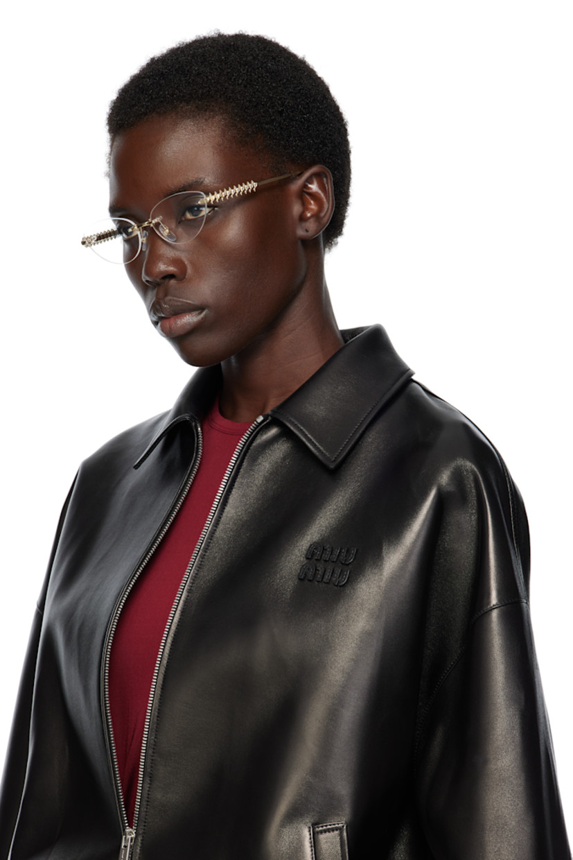 Cat-eye rimless metal-frame optical glasses in gold tone. 

· Adjustable rubber nose pads
· Stud hardware at temples
· Logo etched at temple tips
· Includes case
· Size: 57.16 140

Part of the Clash de Cartier collection.

Supplier color: Gold
